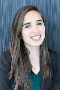Maria Garcia, a youngish woman with long straight brown hair and a black blazer. 