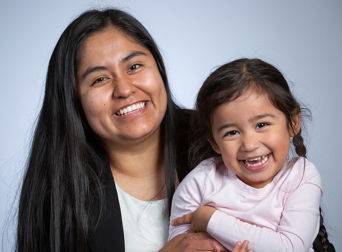 Mom and toddler. Latina mom and toddler girl pose and smile.