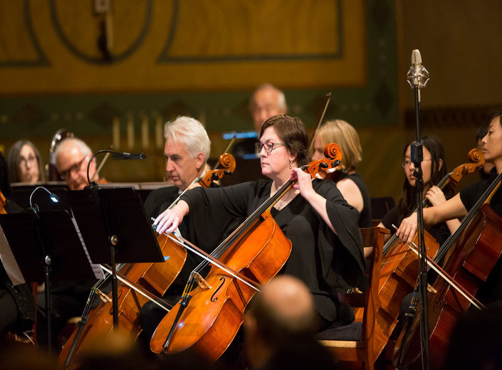 Symphony peformance. Joseph Ordaz conducting the Mission College symphony.