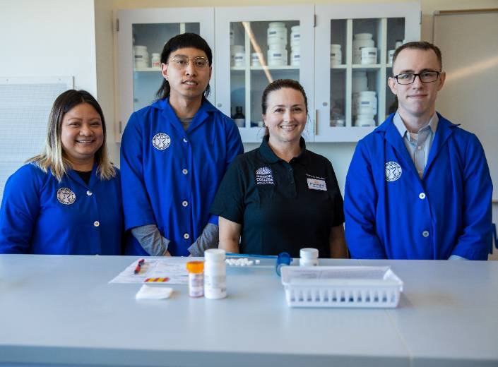 Pharmacy tech students and faculty. Pharmacy tech students and faculty.
