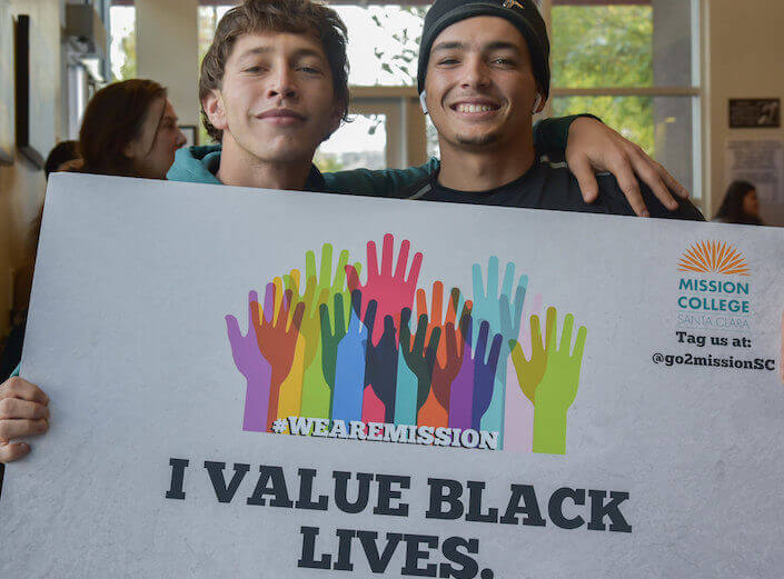 Black Lives Matter sign. Students hold a "Black Lives Matter" sign.