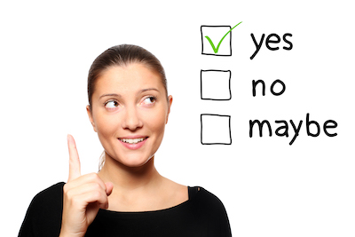 Career Decision. A young woman with dark brown hair pulled back picks "yes" out of three options. The other two options are "Maybe" and "No"