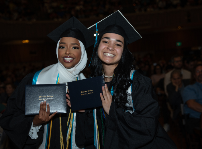 Smiling students at graduation