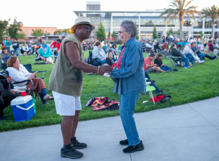 People sitting together on the lawn